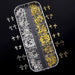 Gold and silver cross nail charms in organiser tray for 3D religious nail art decorations and salon manicure designs