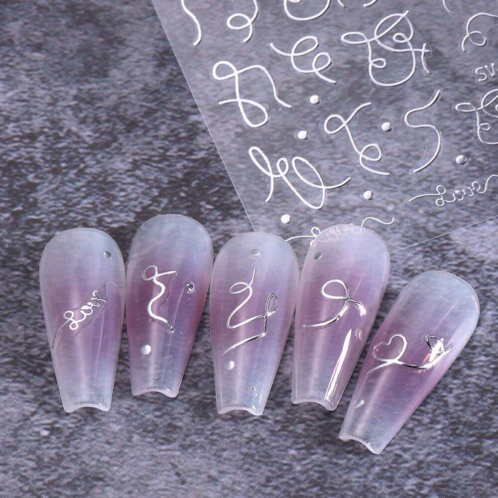 Silver curve stripe line nail stickers on lilac ombré tips, with sticker sheet of squiggles, dots and “love” script — NSI Australia