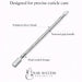 Stainless steel cuticle pusher with polished silver finish, textured grip handle and dual-ended pusher and scraper design