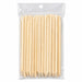 Pack of wooden cuticle pusher sticks with large angled flat ends and pointed tips in clear hanging plastic bag packaging