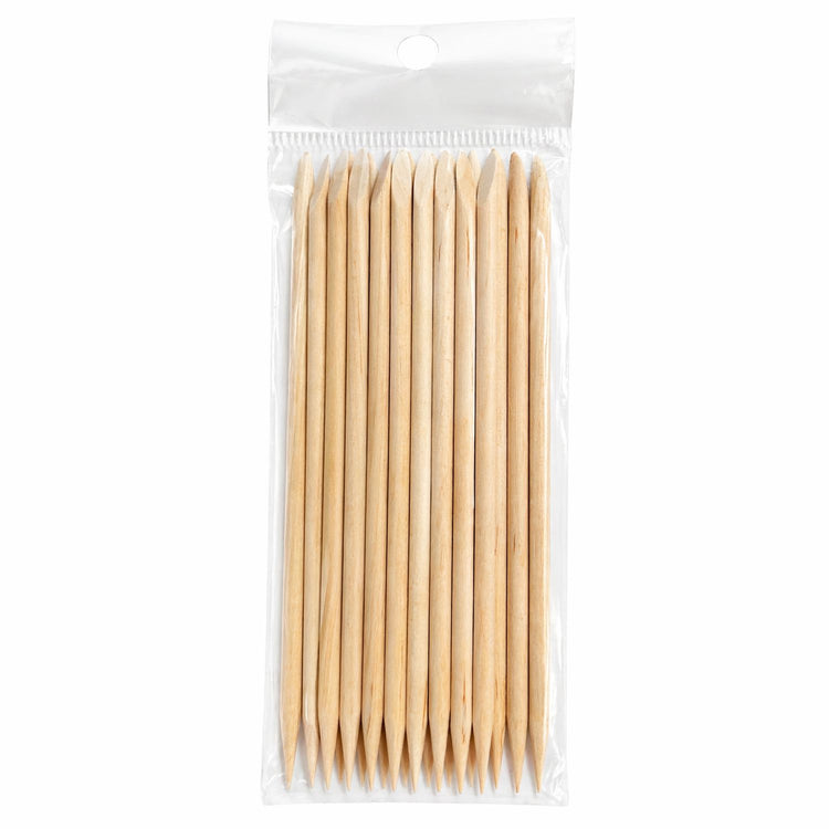 Pack of wooden cuticle pusher sticks in a clear hanging plastic bag on a light gray background