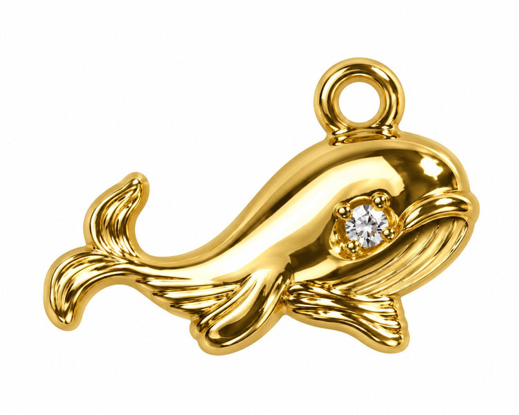 Gold whale dangle nail charm with a rhinestone