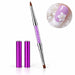 Purple double-ended nail art brush with pointed and flat tips, crystal-filled handle and two protective caps, shown with white 3D floral nail art.
