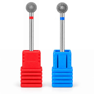 Two 6 mm diamond ball nail drill bits in fine and medium grits, displayed upright in red and blue holders.
