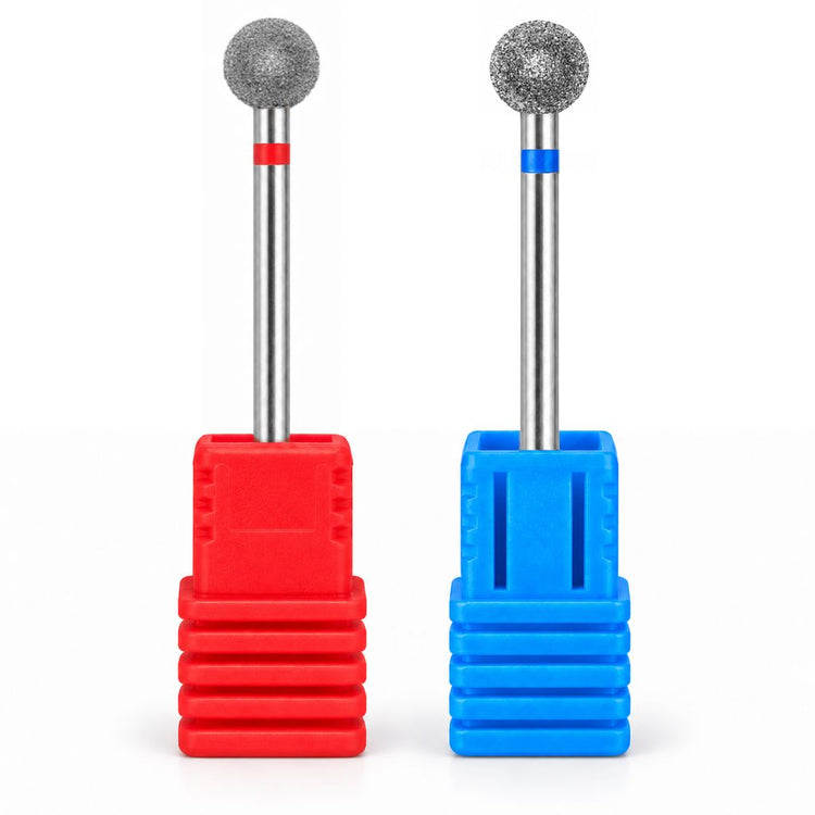 Two 6 mm diamond ball nail drill bits in fine and medium grits, displayed upright in red and blue holders.
