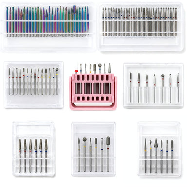 Collection of assorted diamond nail drill bit sets in rainbow and silver finishes, with clear storage cases and a pink display stand.
