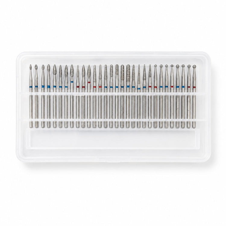 Thirty-piece diamond nail drill bit set with assorted flame, cone, cylinder and ball shapes in a clear storage case.
