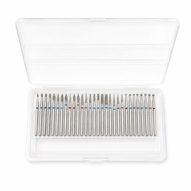 Set of 30 silver diamond nail drill bits in assorted flame, cone, cylinder and ball shapes, supplied in a clear storage case.
