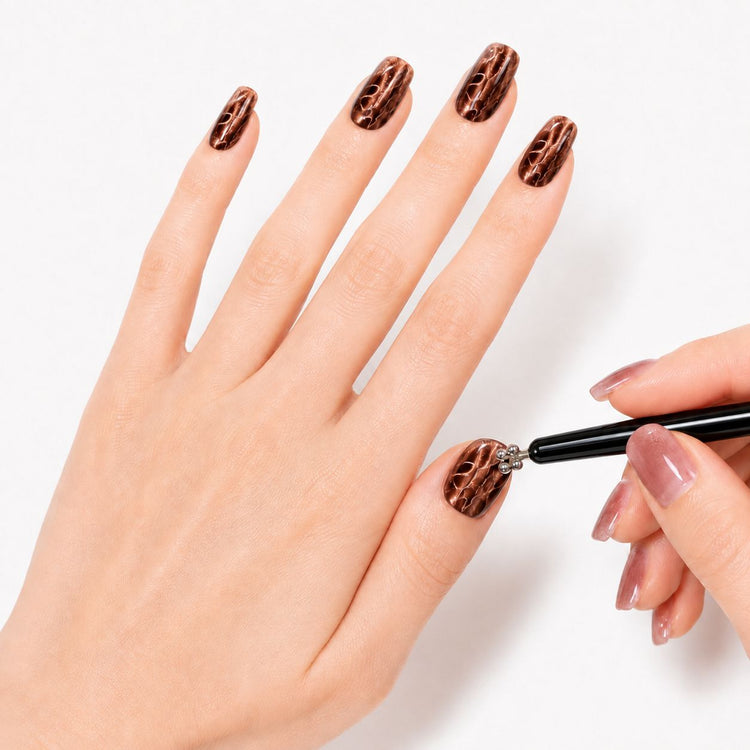 Black double-ended flower and stick cat-eye magnet tool creating brown magnetic gel polish nail art – NSI Australia