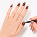 Black double-ended flower and stick cat-eye magnet tool creating brown magnetic gel polish nail art – NSI Australia