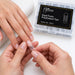 Applying a Nail Success Australia Dual Form PolyExtend square tip, with the 120pcs case