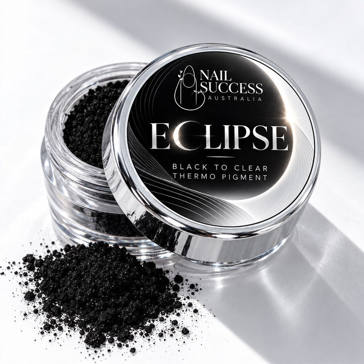 ECLIPSE black-to-clear thermo pigment in a silver jar with the approved Nail Success Australia lid label and black pigment powder on white satin.
