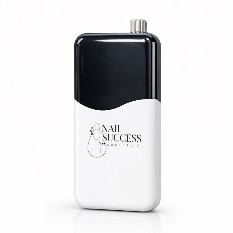 White and black portable electric nail file control box by Nail Success Australia on a plain background