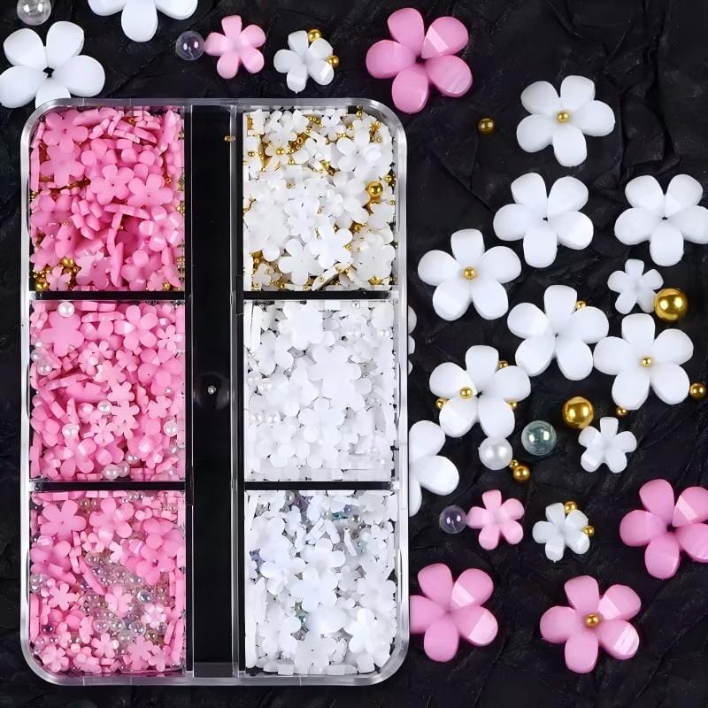 White & pink 3D flower nail art charms — assorted daisy pieces with pearls and gold beads in 6-grid storage box for DIY gel or acrylic nails