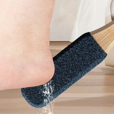 Pedicure foot file used on heel — coarse black grit, wooden handle, callus removal (NSI Australia)