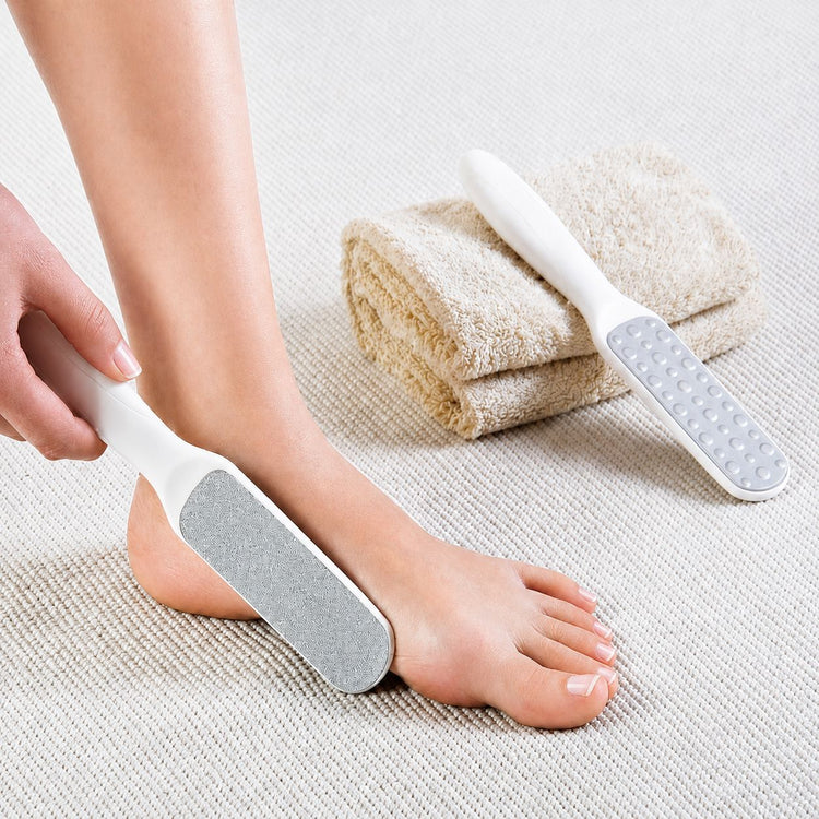 Nail Success Australia white washable pedicure foot file shown in use for smoothing heels and salon foot care