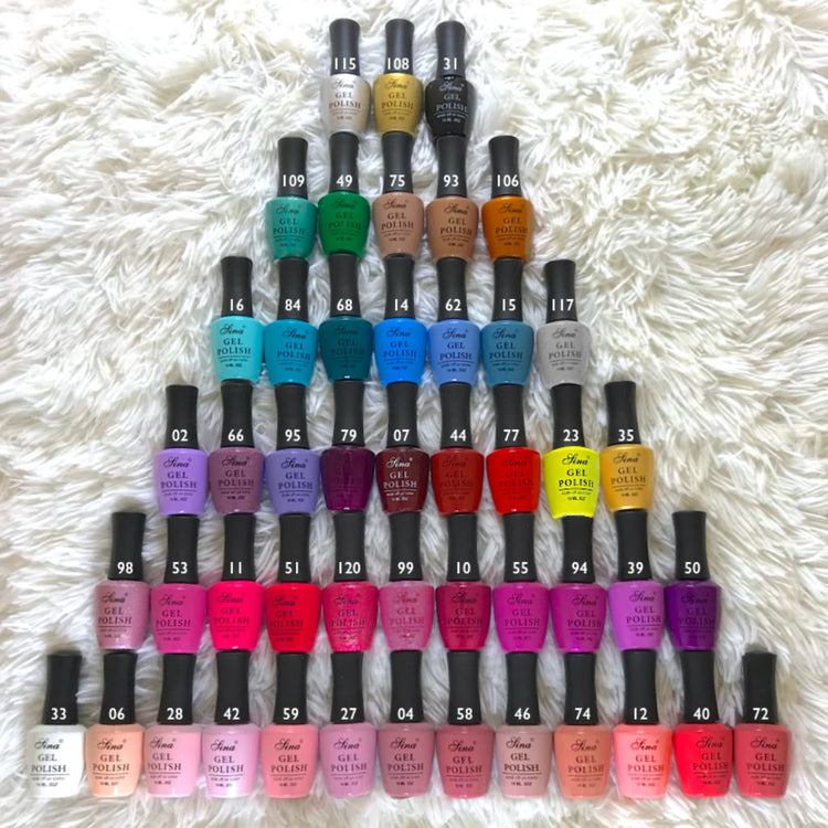 Forty-eight Sina gel polish bottles in bright, pastel and neutral colours, arranged in a pyramid on white textured fabric.
