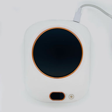 NSI Australia Gel Polish Warmer—USB heat plate for warming gel polish bottles; compact white unit with round black surface