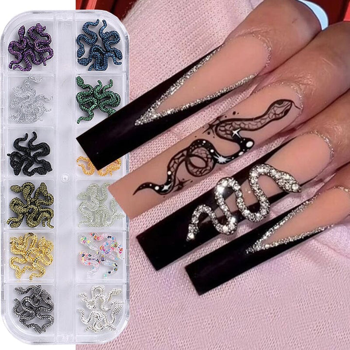 3D snake nail charms set – 12 color rhinestone snakes in storage case, shown on long nude/black coffin acrylic nails – Halloween nail art decoration