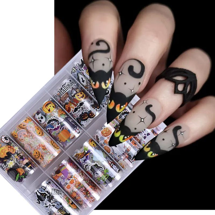 Halloween nail transfer foil set (10 rolls) — spooky patterns in organiser box with black cat Halloween nail design example