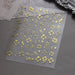 Nail Success Australia BTF-S51 gold hibiscus flower nail stickers with floral, star and swirl designs on grey background