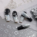 Nail Success Australia silver hibiscus flower nail stickers shown with black and grey floral manicure designs