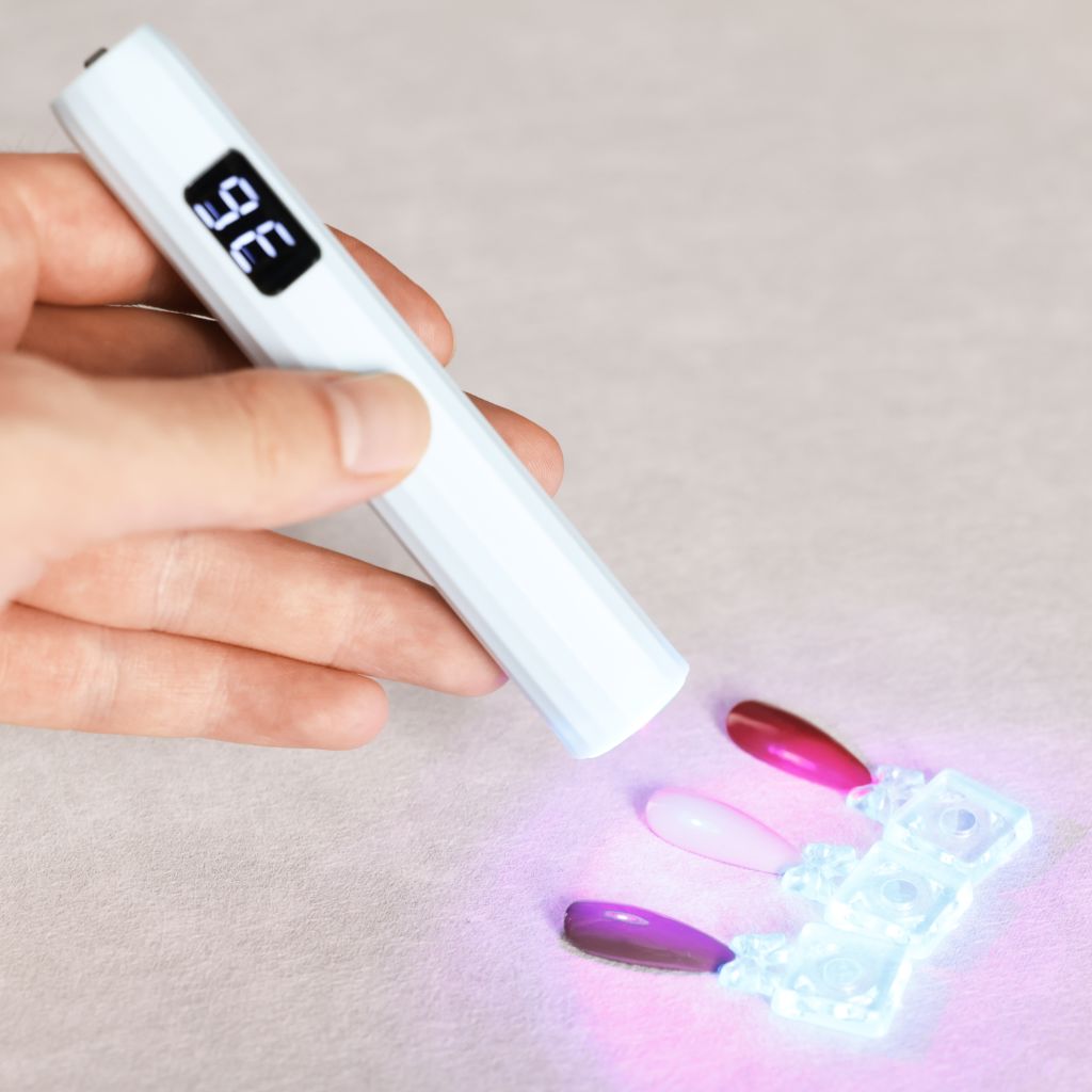 USB-rechargeable LED nail flash-cure torch with digital timer—handheld pen lamp curing gel polish swatches, Nail Success Australia
