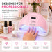 Professional pink 80W UV LED nail lamp with 36 LEDs curing gel nails in a salon setting