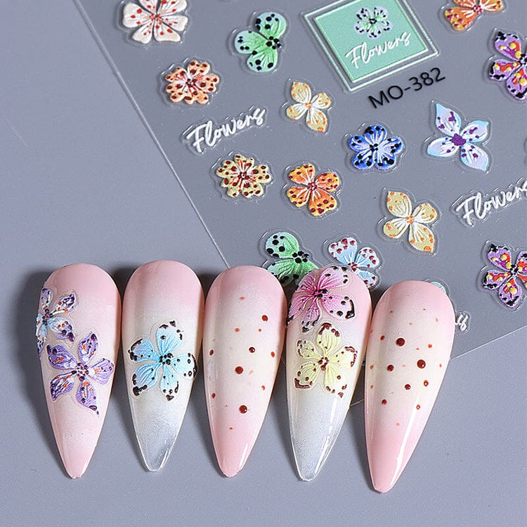 MO-382 Lily and Hibiscus Flower Nail Art Sticker sheet with colourful floral designs on pink manicure samples