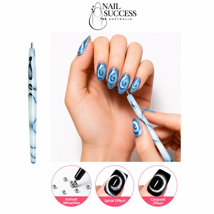Blue marbled cat-eye magnet pen creating spiral and crescent effects on magnetic gel polish nails – Nail Success Australia