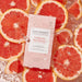 VOESH New York Mani Moments Vitamin Recharge DIY at-home spa manicure kit surrounded by fresh grapefruit slices