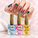 Marbled nail art made with NSI Marble Ink Polish, shown with three bottles