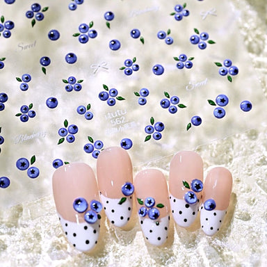 Mini blueberry embossed nail art sticker sheet with blue berry and green leaf designs on nail samples