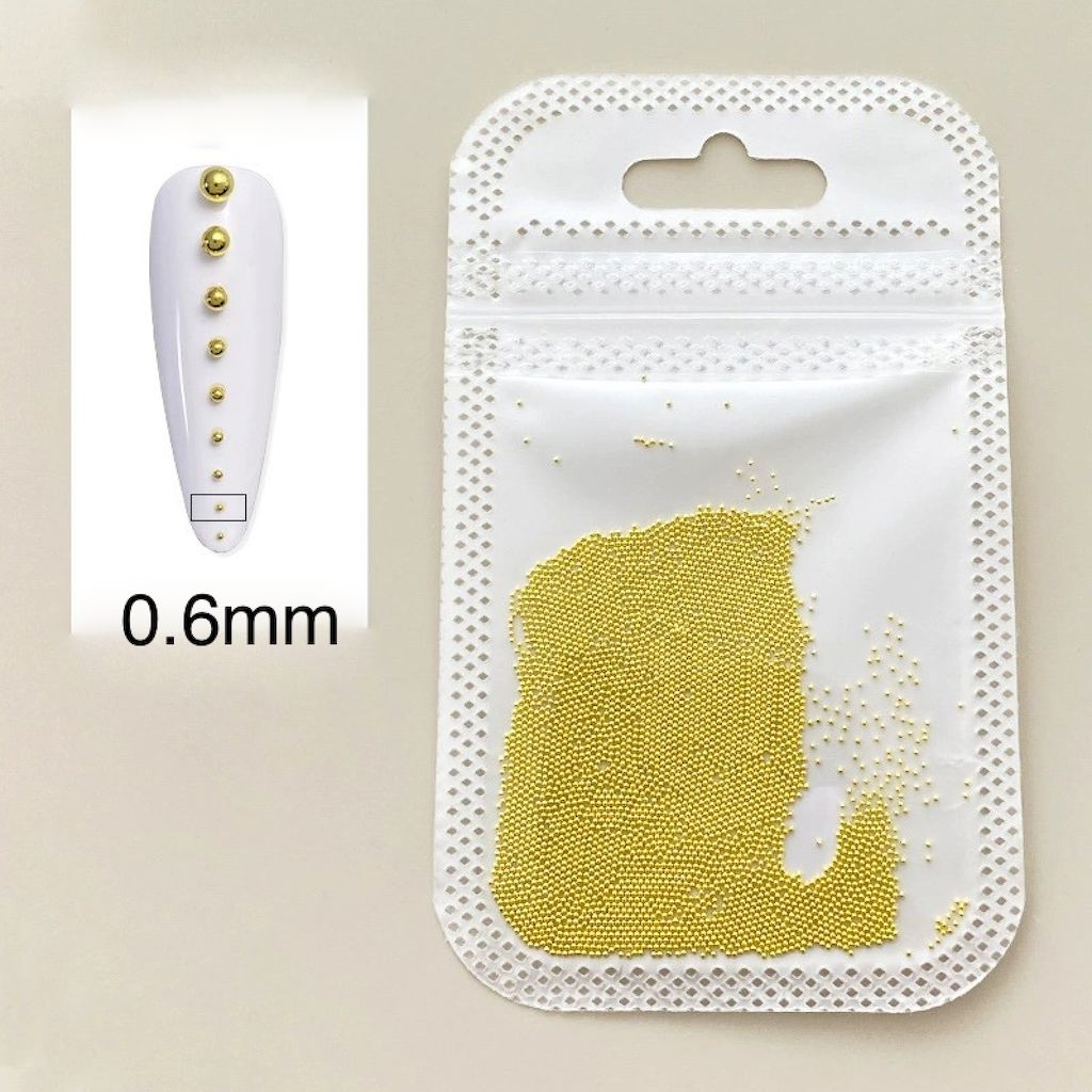 Mini gold caviar beads 0.6mm for nail art — micro steel balls for 3D accents