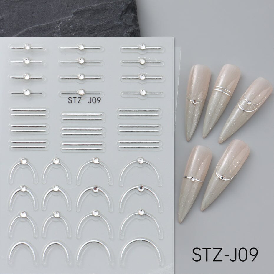 NSI Australia STZ-J09 Nail Art Stickers – silver metallic striping bars and curved French tip decals with crystal studs, self-adhesive, shown on sample nails