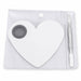 White heart-shaped nail art mixing palette with stainless steel spatula tool in clear storage pouch for gel polish blending and salon nail designs