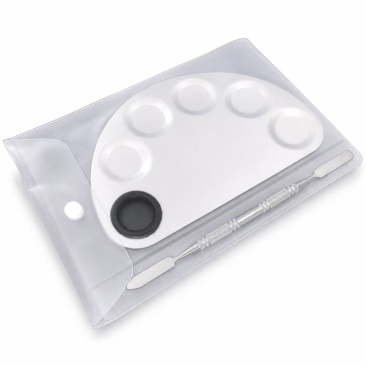 White nail art colour mixing palette and stainless steel spatula tool in clear storage pouch for gel polish blending and salon nail designs