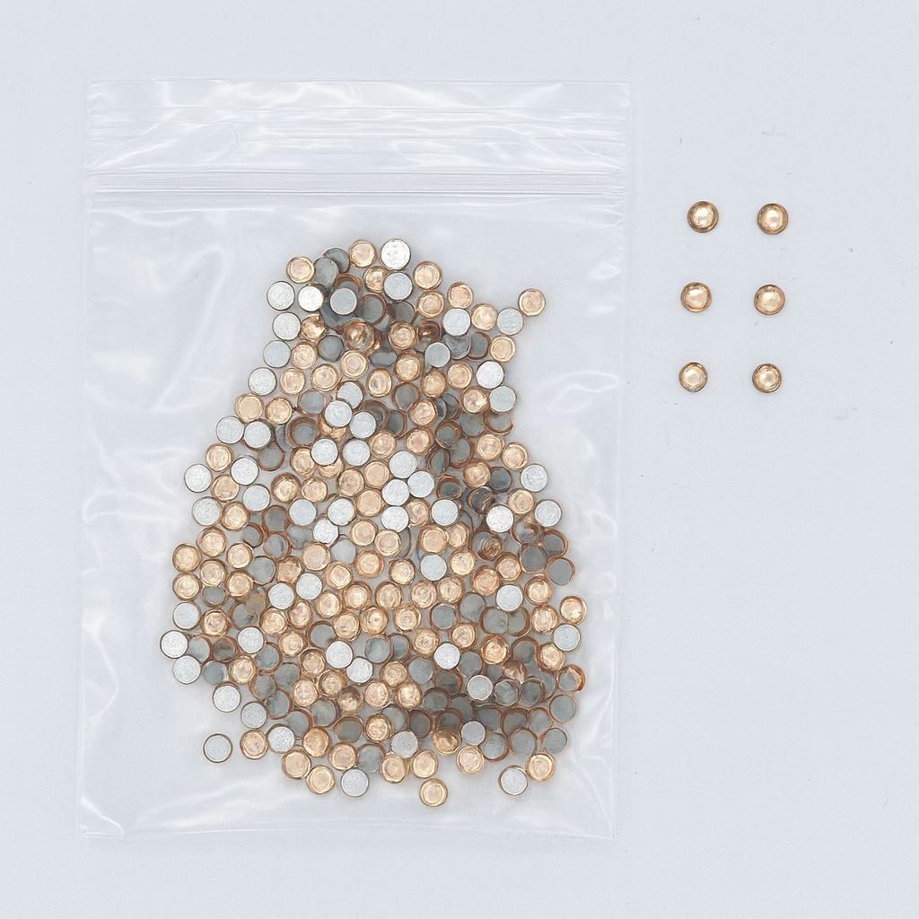 Gold round nail art rhinestones — 1.8 mm (R18) — zip bag with loose sample pieces