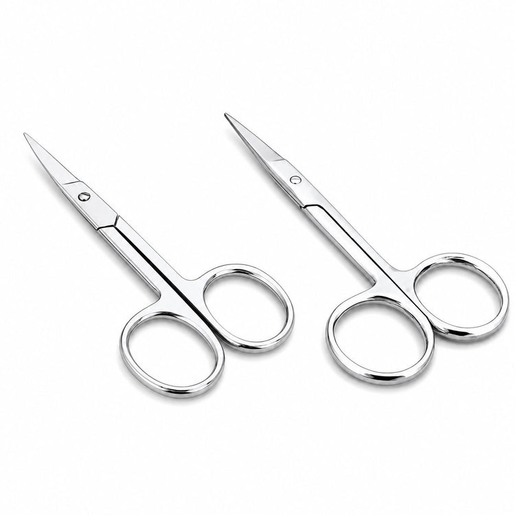 Stainless steel nail and cuticle scissors with straight and curved precision blades, sharp tips and classic finger loop handles for detailed manicure grooming