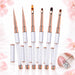 Six nail art brushes with liner, ombré, oval and square tips, crystal-filled handles, rose gold ferrules and matching caps.