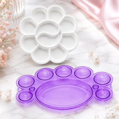 White flower and purple paw nail art colour mixing palettes with multi-well design for gel polish blending and creative salon nail art designs
