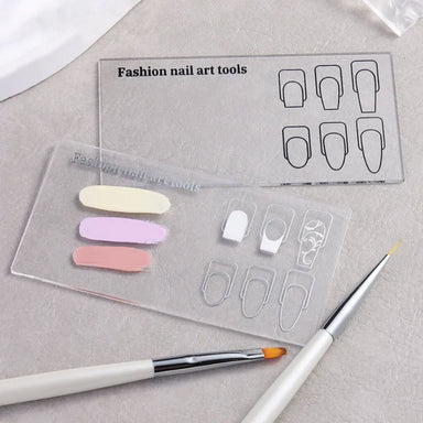 Clear nail art design palettes with nail shape guides, gel polish swatches and manicure brushes for design practice