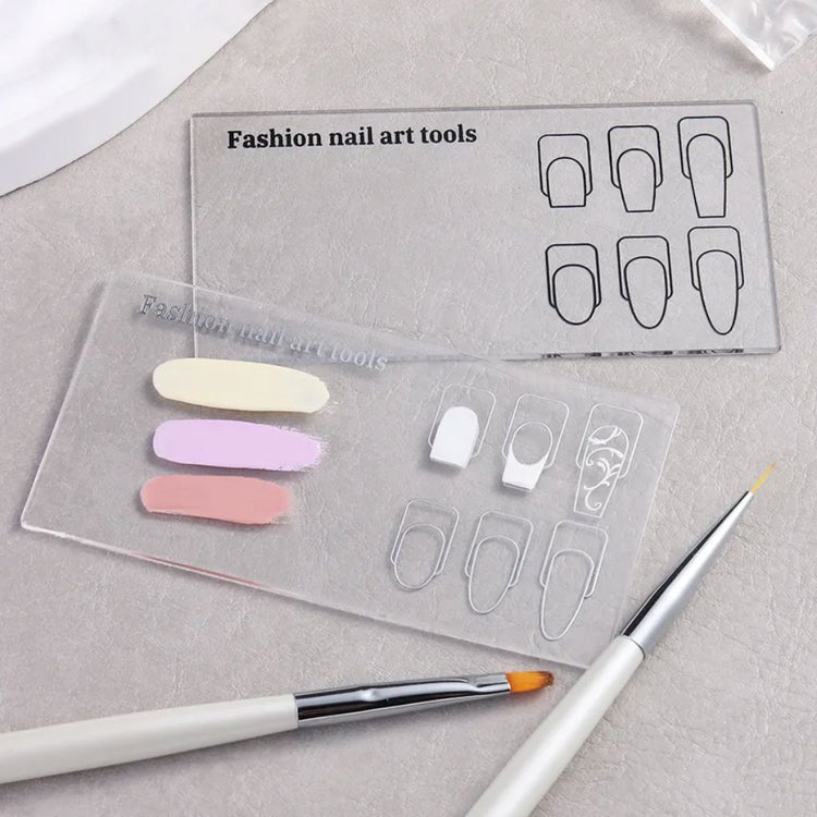 Clear nail art design palettes with nail shape guides, gel polish swatches and manicure brushes for design practice