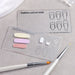 Clear nail art design palettes with nail shape guides, gel polish swatches and manicure brushes for design practice