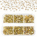 Gold nail art rhinestones set — mixed sizes in clear compartment tray with scattered crystals — NSI Australia