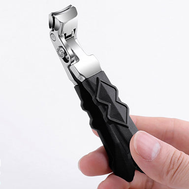 Wide-jaw nail clipper with anti-slip black handle — stainless steel, shown in hand (NSI Australia)