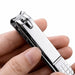 Silver large curved blade nail clipper held in hand showing smooth lever design and textured grip, NSI Australia