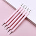 Pink 5-piece double-ended nail dotting tools with precision metal ball tips for dots, flowers and fine nail art details