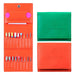 Green and orange nail drill bits storage cases with fold-out pockets and assorted e-file drill bits