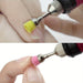Close-up using nail drill brush bit to clean nail dust around cuticle